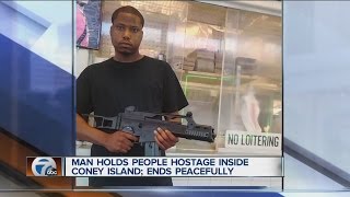 Man holds people hostage inside coney island