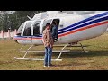 tovino thomas landing in christ college ground in helicopter. bell407 chipsanaviation