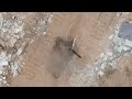 footage of a terrorist armed with an rpg emerging from a tunnel shaft in eastern deir al balah