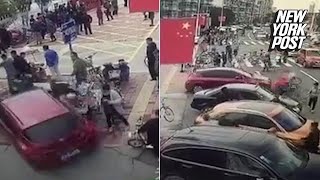 Driver accidentally swings through a crowd of people | New York Post