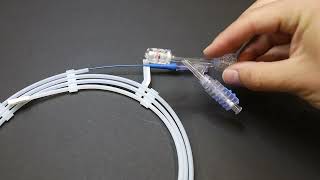 How To Load a Neurovascular Implant in a Microcatheter and Test it in a Vessel Modell