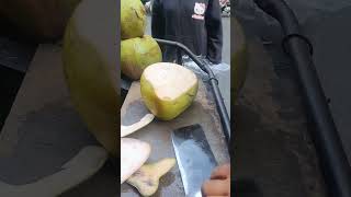 Hand skills in cutting coconut