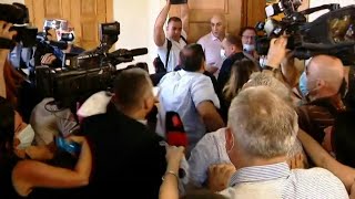 Georgian opposition parliamentarians scuffle with ruling party MPs | AFP