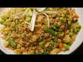 a ground black pepper golden fried rice that is crisp with amazing flavor