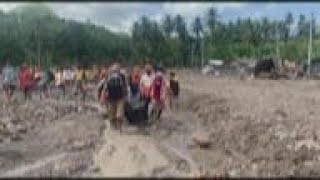 Philippine rescuers retrieve bodies after landslide