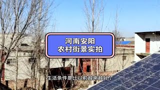 河南安阳一农村街景实拍，年轻人都回来过年了，街上路两边车也开始多了起来，道路也开始堵了