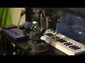 robot arm plays lush generative chords on the nymphes