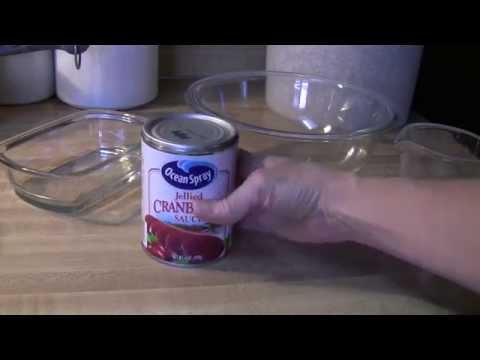 Thanksgiving Food Removing Cranberry Sauce in One Piece Thanksgiving Food Removing Cranberry Sauce in One Piece