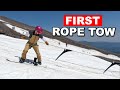 Teaching How To Ride the Rope Tow - Beginner Snowboarding