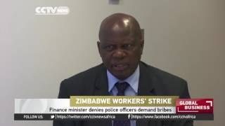 Zimbabwe’s finance minister denies police officers demand bribes