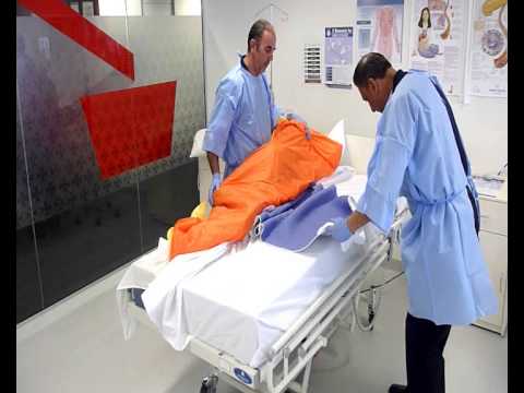 Linen change without moving patient out of bed Linen change without moving patient out of bed