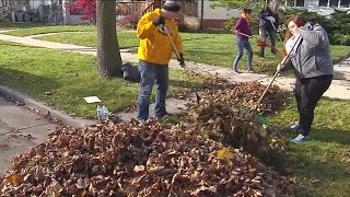 Volunteers help residents in need with yard work