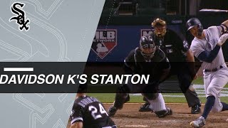 Infielder Matt Davidson strikes out Giancarlo Stanton