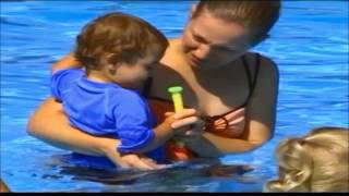 YMCA teaching kids how to dive into swimming