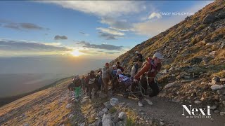 Paralyzed hiker summits Mount Elbert, with some help
