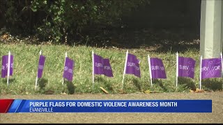 YWCA places purple flags outside building to represent women who sought shelter in 2018