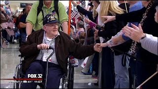 WWII vets returning from DC receive hero's welcome at Midway Airport