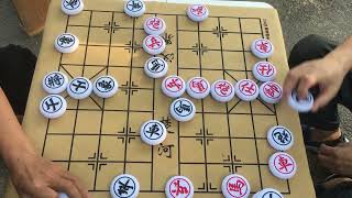 黑棋的经典杀招车马炮围攻，全力的进攻棋看着就是过瘾，真精彩