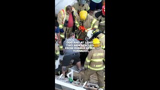 Dog and at least two men rescued from rubble after tornado