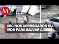 Arriesgan su vida para rescatan a bebé atrapado por inundaciones en Ecatepec