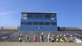 Sledgehammers are ceremonially swung during the demolition ceremony for Tommy Oliver Stadium i...