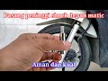 Pasang peninggi shock depan matic