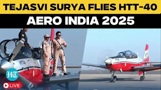 Aero India 2025 Live | BJP MP Tejasvi Surya Flies HTT-40 Trainer Aircraft At Aero India 2025