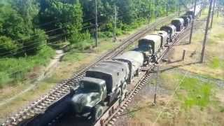 2 in 1: Russian railways transport vehicles and personnel to East Ukraine