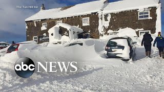 ‘Wonderwall’ of snow: Pub patrons stranded by blizzard in England