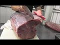 masterful cutting of a 300kg giant blue marlin for premium sashimi