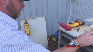 Korte HVAC Service Technician Trevor Miller works in dangerous heat