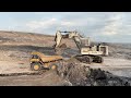 liebherr 9350 excavator loading komatsu dumper