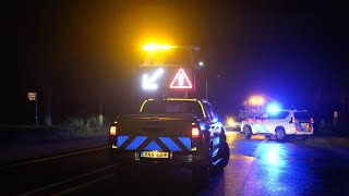 Motorist flies over traffic island into ditch due to slippery conditions