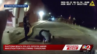 Community outraged after video surfaces of Daytona Beach police officer punching a handcuffed man