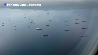 Dozens of ships wait to go through drought-hit Panama Canal | AFP