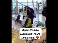 Japan airport staff handling the luggage.