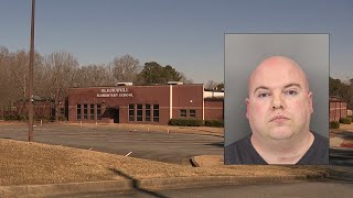 Cobb County teacher accused of spying on students with cameras in boys bathroom