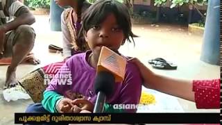 People celebrating onam in Thrissur Potta Relief camp