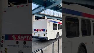 SEPTA 2008 new flyer DE40LF #8199 with little bits of graffiti on the back of the bus.