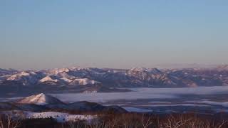 雲海と雪化粧した阿寒の山々が美しい摩周湖からの風景   HD 1080p