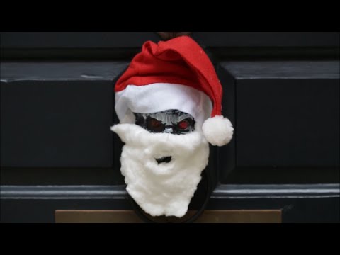 What 3 places does the Ghost of Christmas Present take Scrooge?