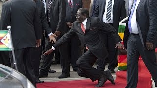WATCH: Robert Mugabe falls down steps in Harare