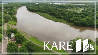 Minnesota River floods in Carver County, closing only road north