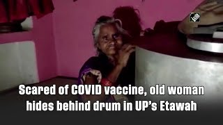 Scared of COVID vaccine, old woman hides behind drum in UP’s Etawah