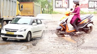 തകർന്നടിഞ്ഞ് വൈക്കം റോഡ്. പ്രതിഷേധമുയർത്തി നാട്ടുകാർ.