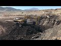 caterpillar 385cl excavator loading coal on trucks sotiriadis labrianidis mining works