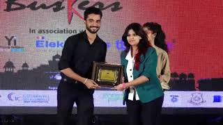 Anchor Aditya Singh awarded by Buskers (RJ Chitrangada)for hosting semi finals of D”Fest 2018.