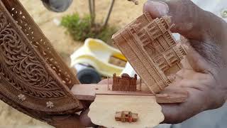 Sandal Wood Carving Artist showing his Masterpieces