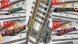 Replacing a point in the crossover and plenty of Hornby Railways items running.