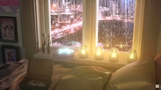 The sound of rain in a bedroom with a city night view